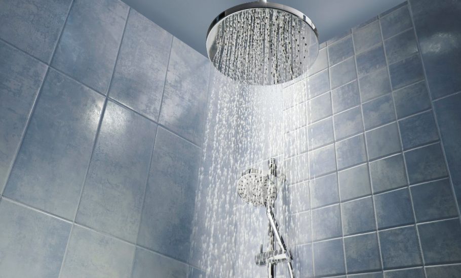 Photo of showerhead and water John G. Plumbing Drain and Sewer Cleaning