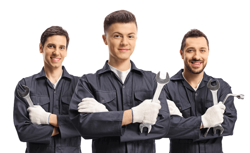 Picture of three plumbers smiling while holding their tools.