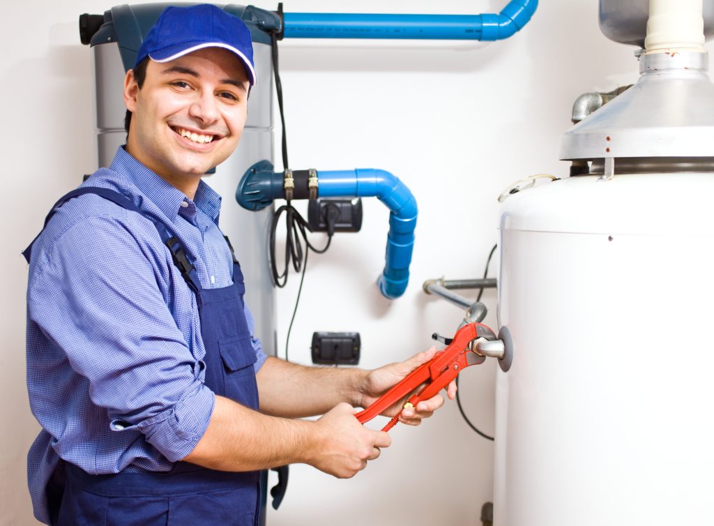 water heater plumber installing a hot water