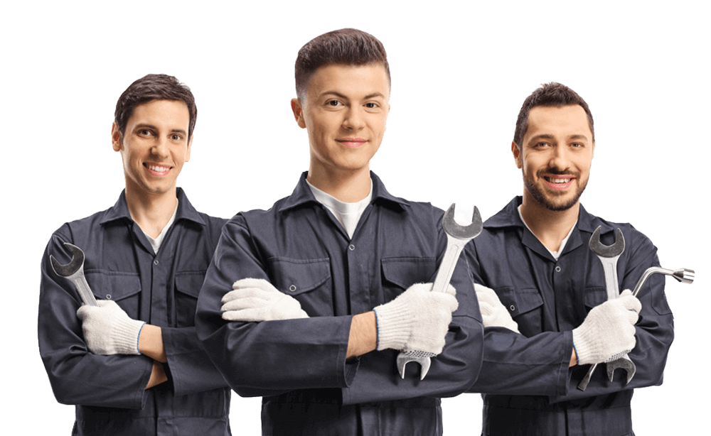 Picture of three plumbers smiling while holding their tools.