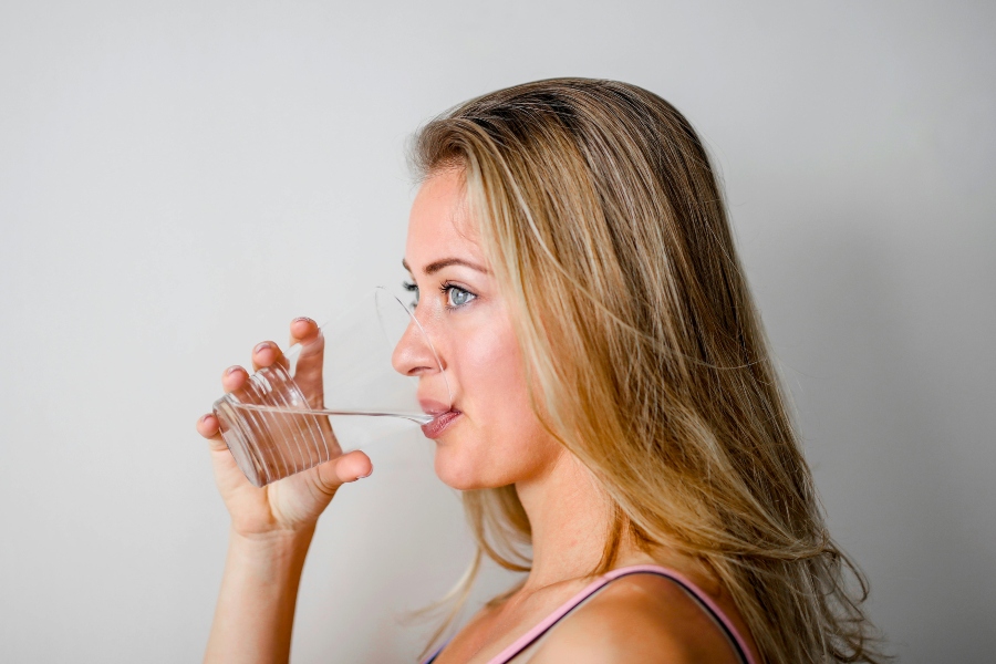 A Nanaimo woman drinks clean water.