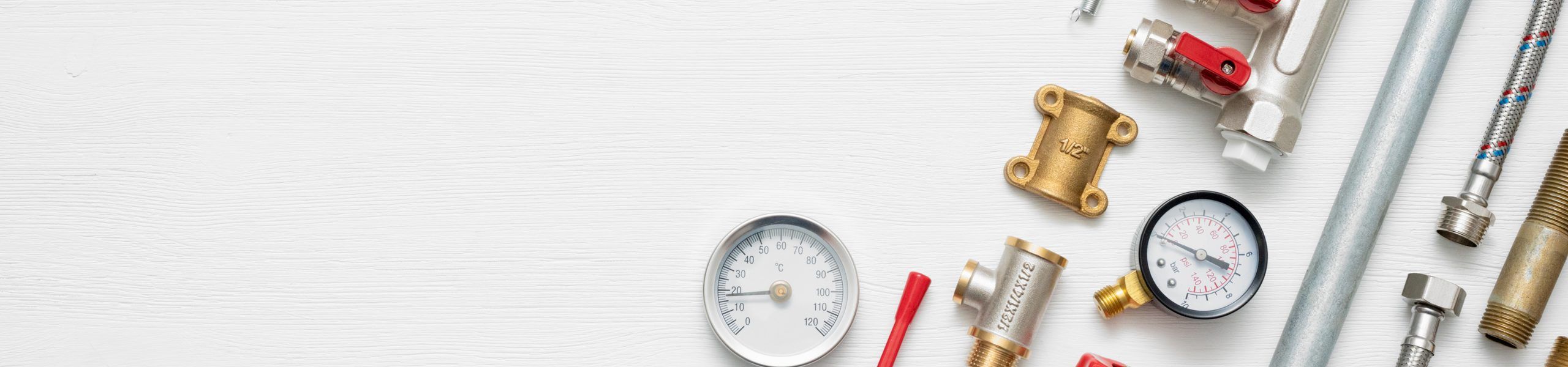 Plumber fixing tap in bathroom John G. Plumbing Drain and Sewer Cleaning