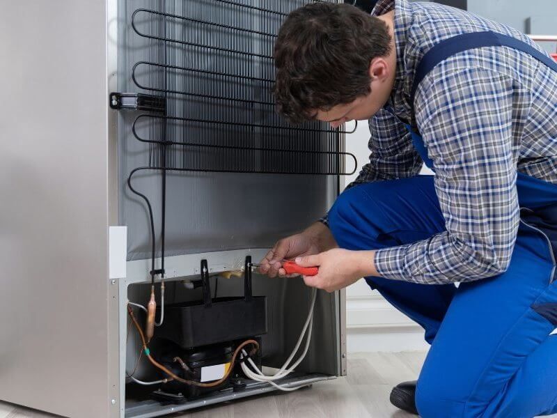 Plumber fixing pipe John G. Plumbing Drain and Sewer Cleaning