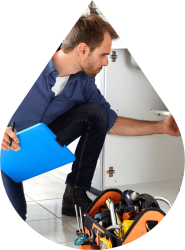 John G. Plumbing Inc. plumber working on sink