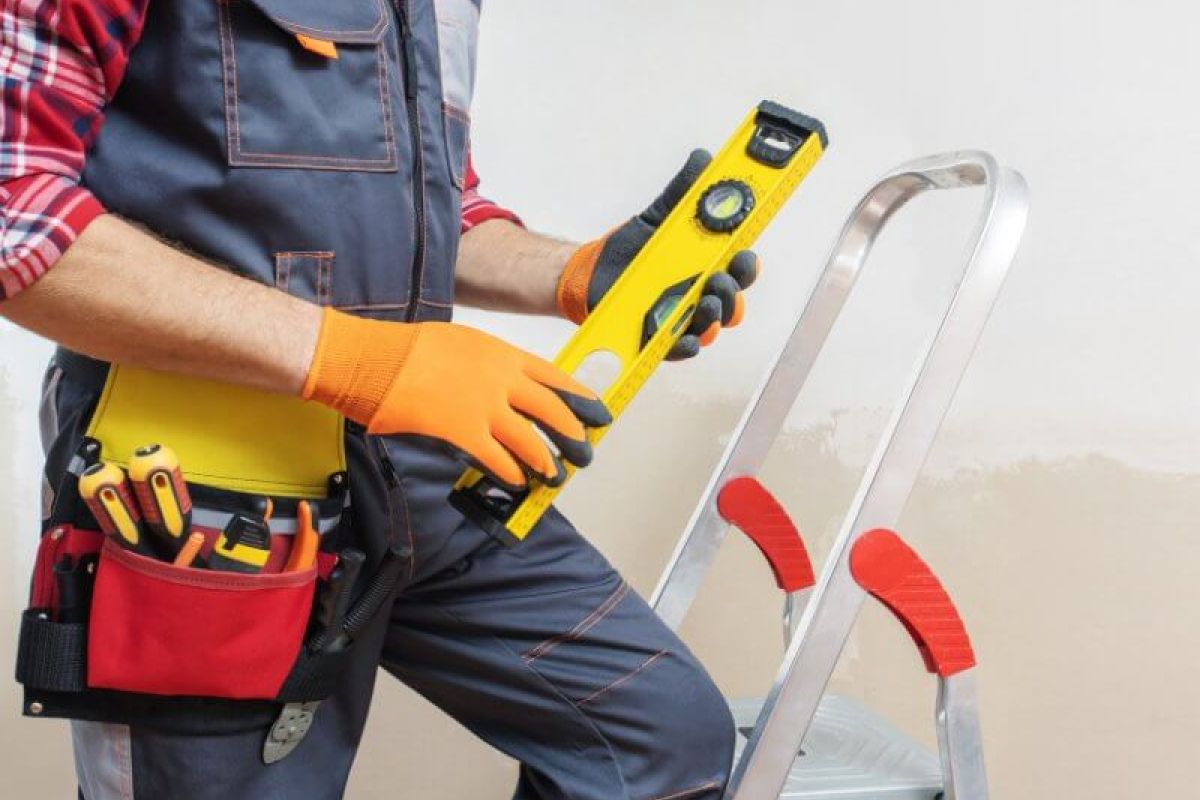 John G. Plumbing construction worker working on project