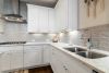 A beautiful kitchen with functioning plumbing.