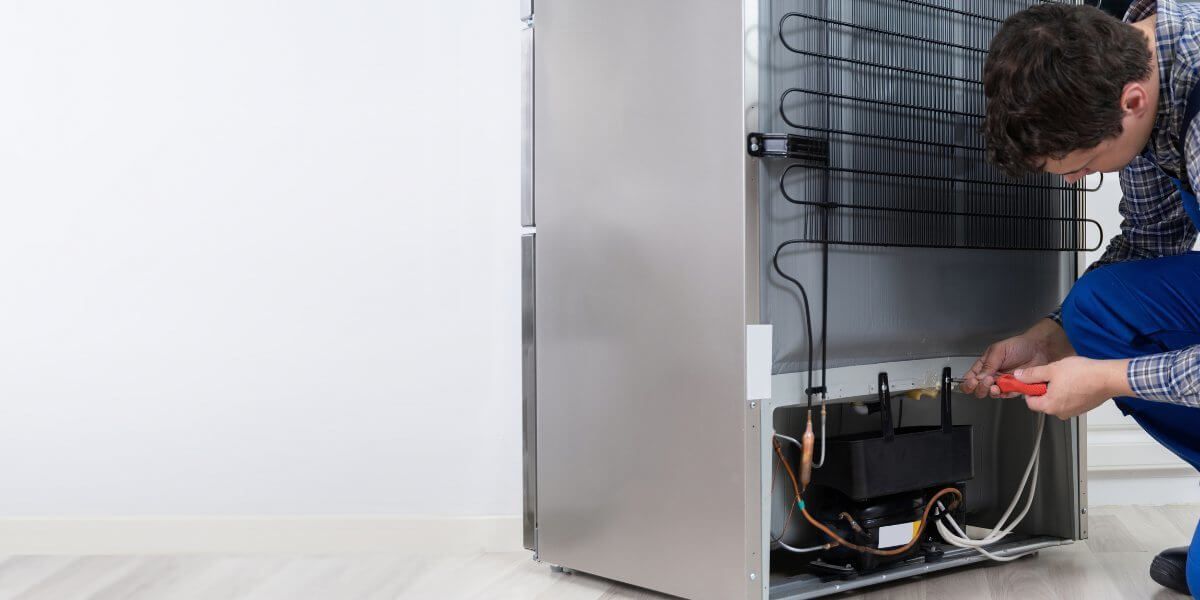 Plumber fixing pipe John G. Plumbing Drain and Sewer Cleaning