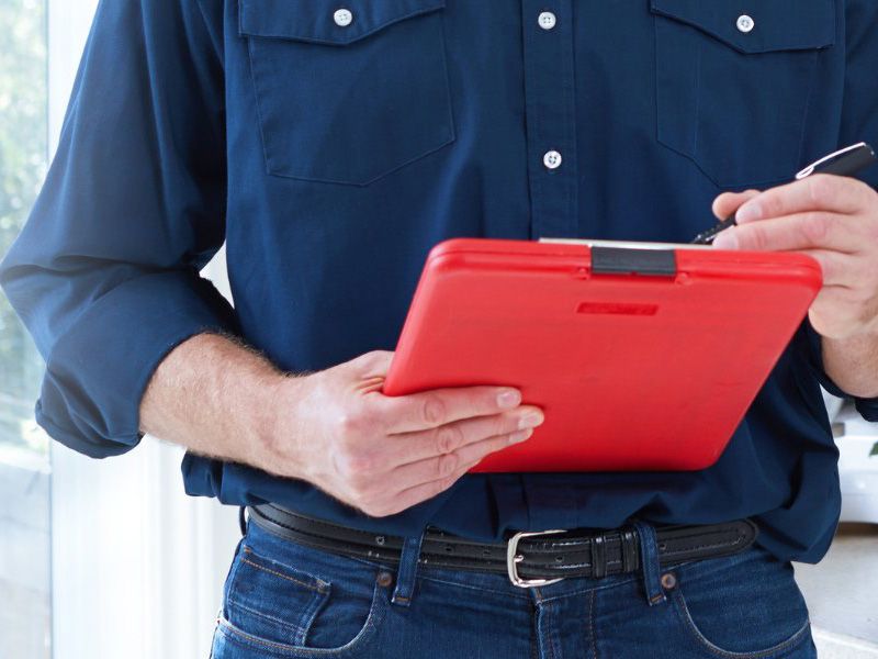 John G. Plumbing plumber with clipboard Gas and plumbing tips and news