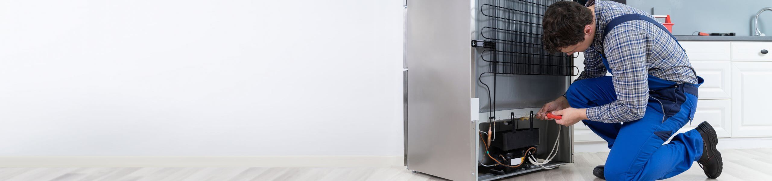 Plumber fixing pipe John G. Plumbing Drain and Sewer Cleaning